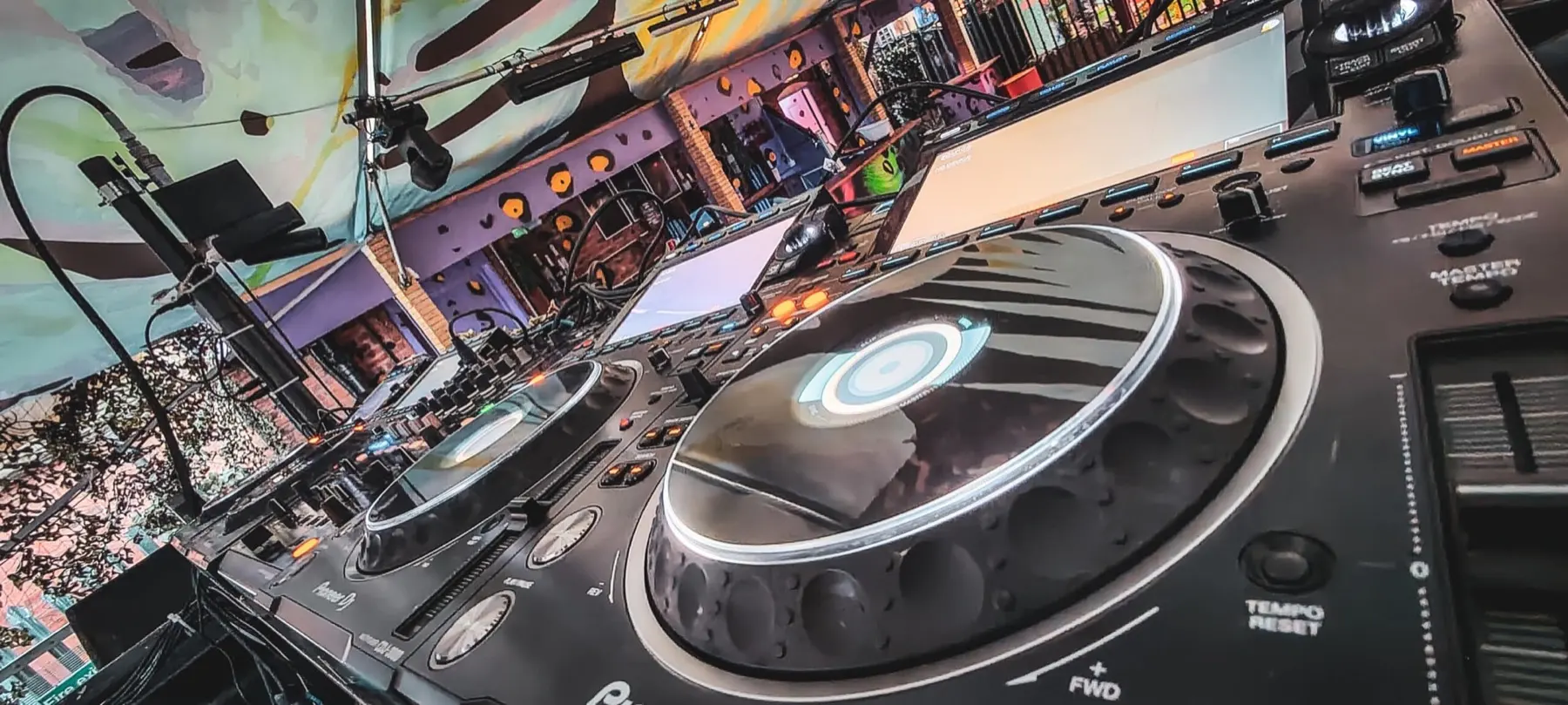 Professional DJ equipment in a live event setting